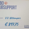 De cheque die nu op het prikbord hangt